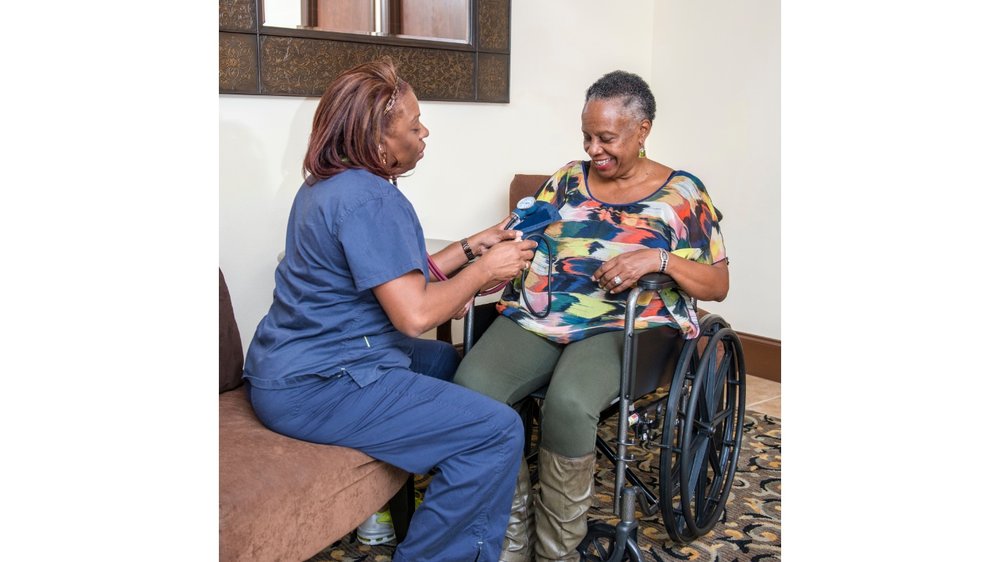 PSW providing personal support to senior client