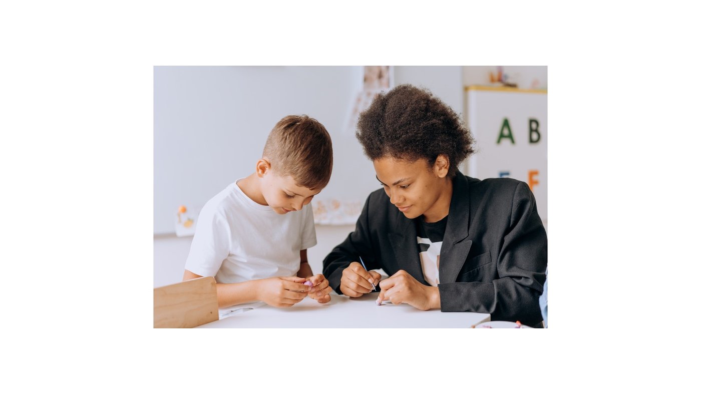 Developmental support worker with child at Visible Hands